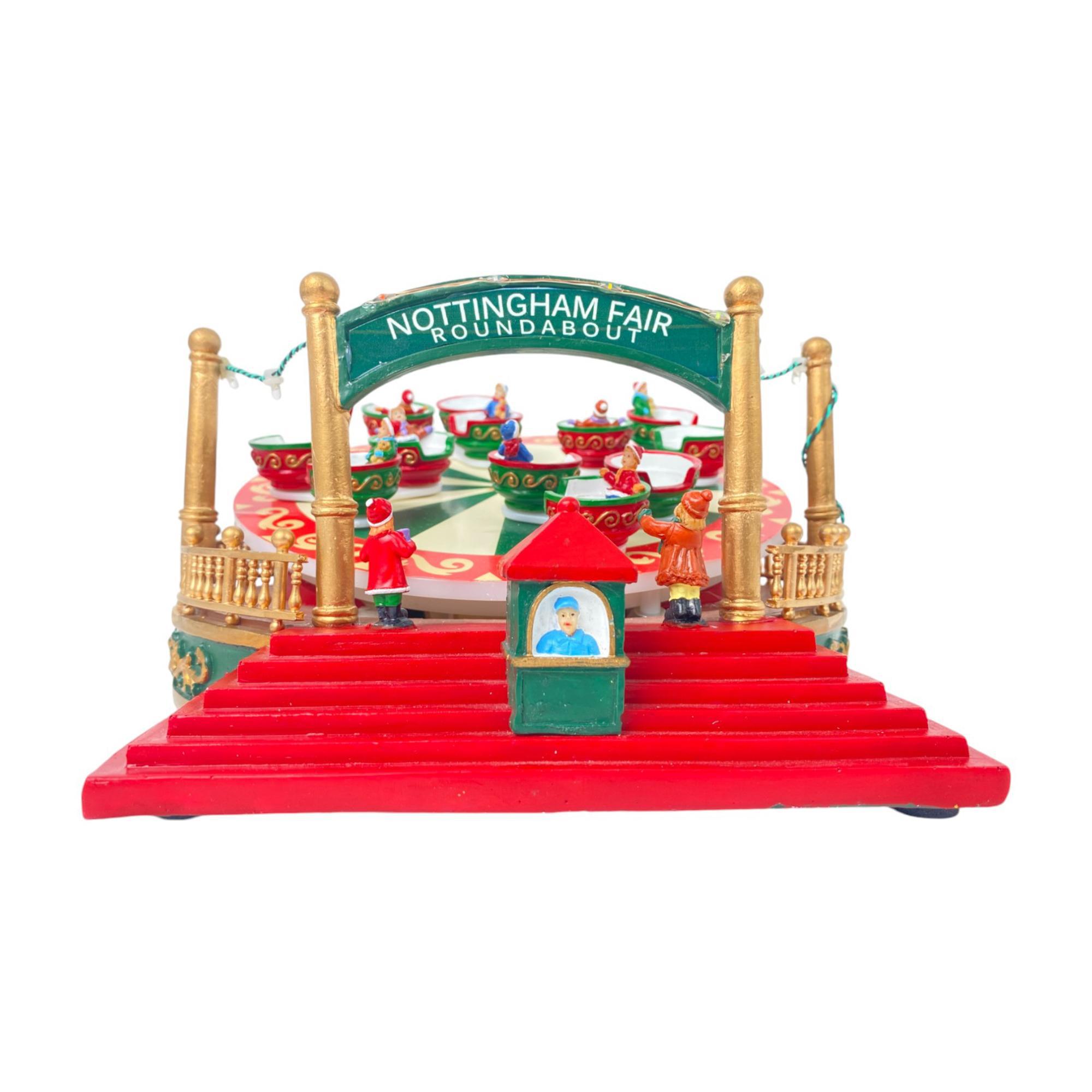 POLY ROUNDABOUT W/LED LIGHT AND MOVEMENT (USE 3PCS 1.5V "AA" - 201-9500095B